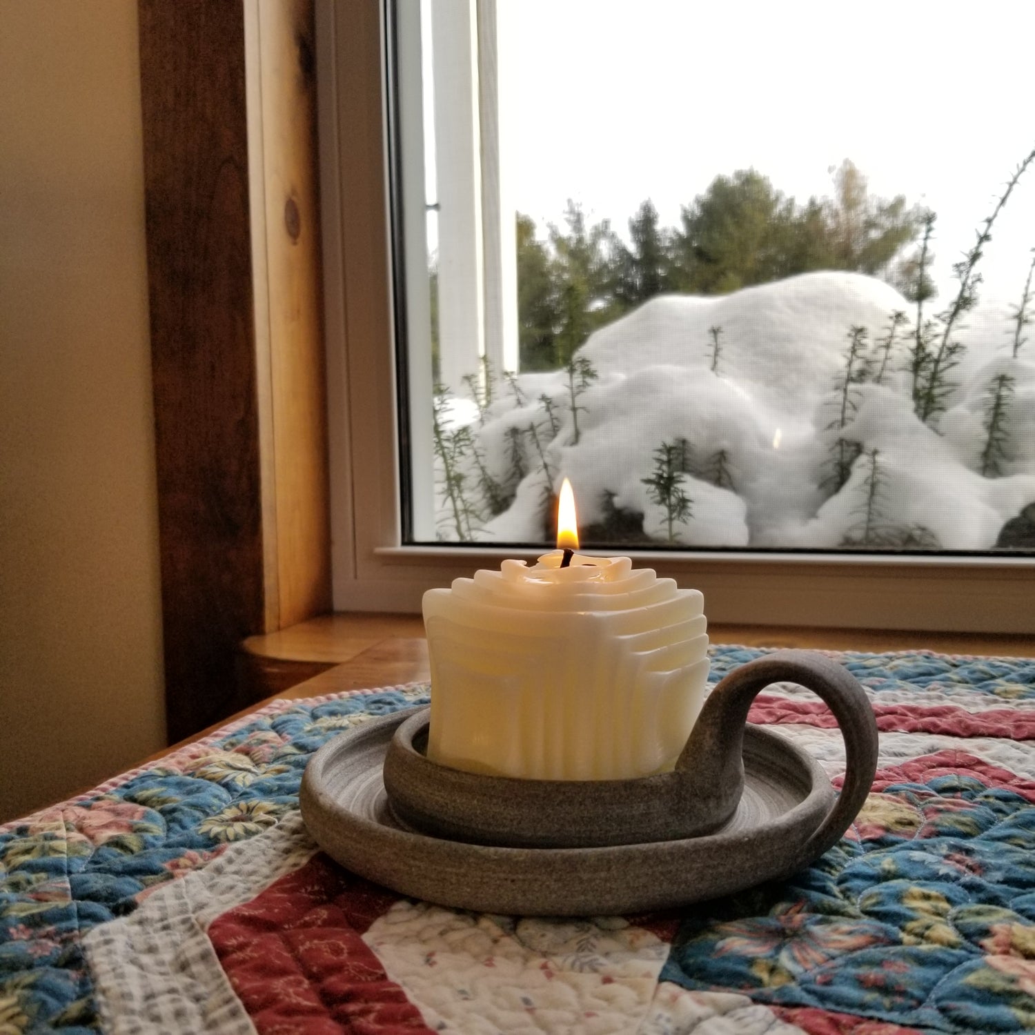 lit pure beeswax white squares on squares pillar candle