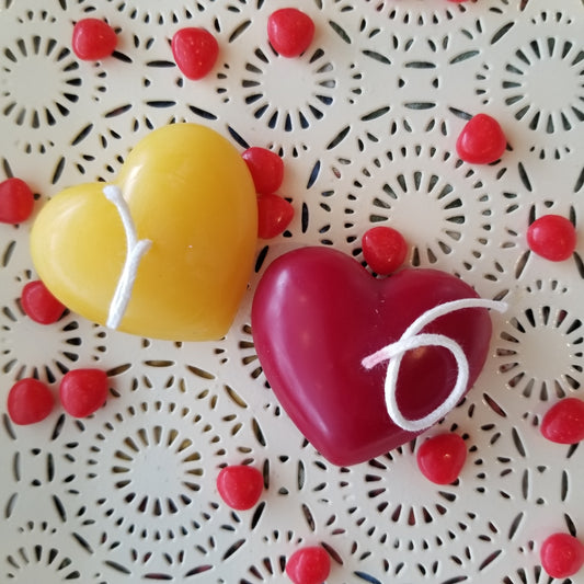 Yellow and red beeswax heart candles