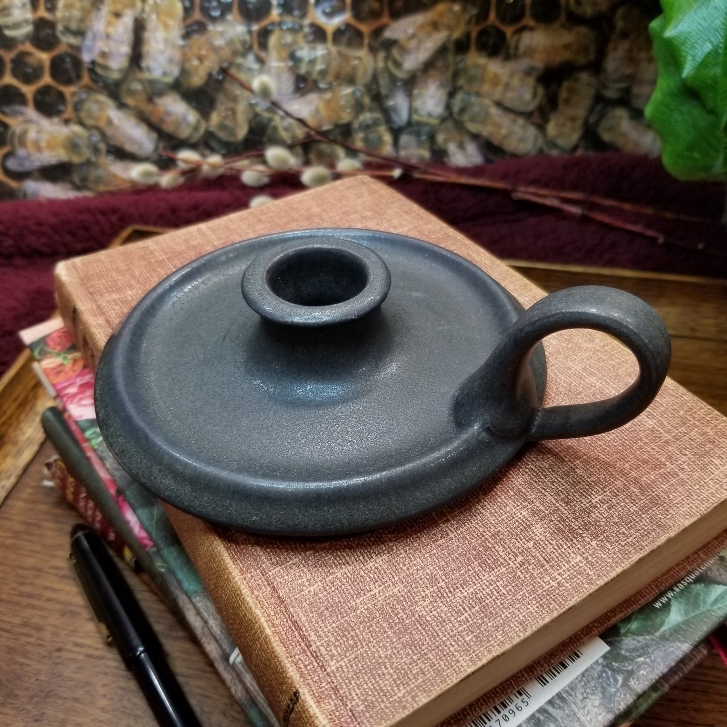 matte black pottery taper holder with handle