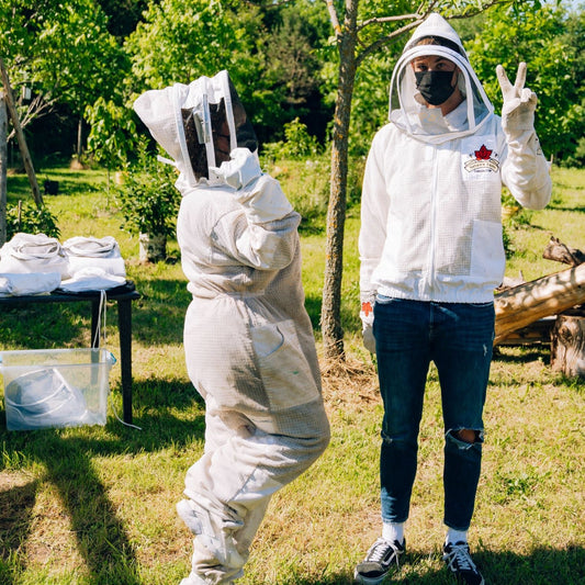 Buzz About Bees guests geared up in their beesuits